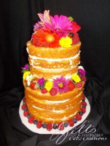 2 tier Naked cake with fresh fruit and flowers